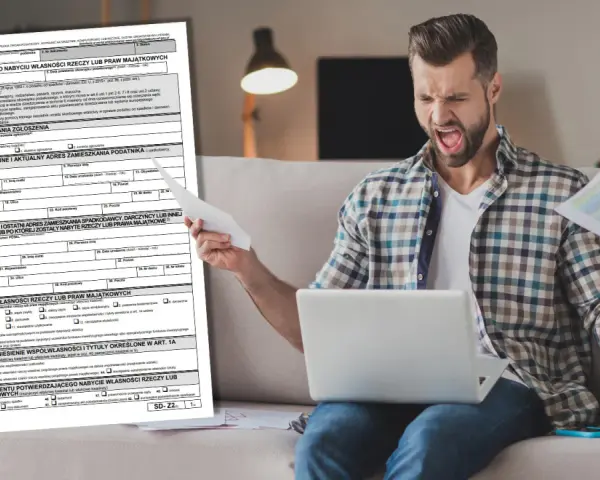 Zirytowany mężczyzna z dokumentami i laptopem, obok formularz SD-Z2.