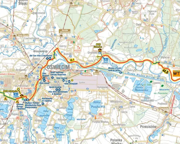 Trasy rowerowe Małopolska: mapa okolic Oświęcimia z zaznaczonymi szlakami, atrakcjami i drogami wodnymi Wisły.
