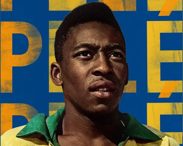 Portret młodego Pelé na tle wielkich, żółtych liter. Ile złotych piłek ma Pelé? Tyle, ile zdobył tytułów mistrza świata!