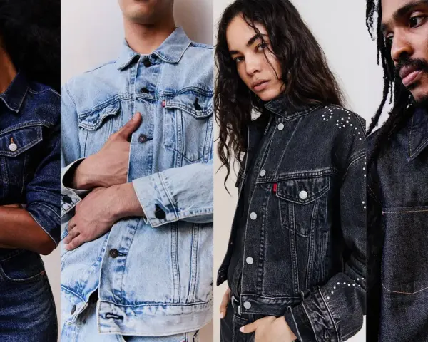 Modelli diversi indossano giubbotti di jeans, alcuni con borchie, altri classici. Un giubbotto sopra giacca è un look versatile.