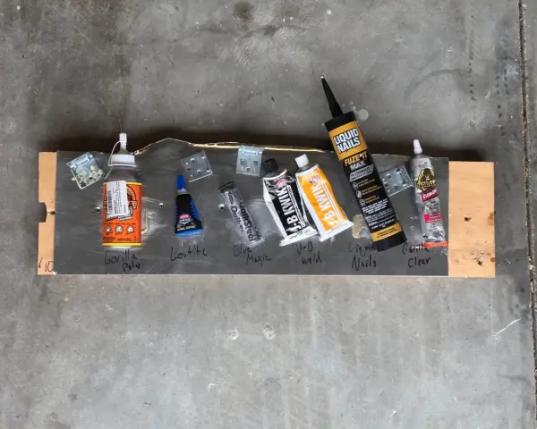 Adhesives are laid out on a board, including Gorilla Poly, Loctite, and Gorilla Clear, to test if Gorilla Glue works on resin.