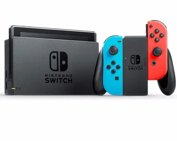 Konsola Nintendo Switch z dokiem i kontrolerami Joy-Con w kolorach niebieskim i czerwonym. Forza Nintendo Switch!
