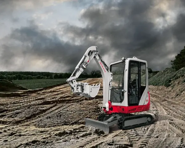 Mini koparka Takeuchi TB216 na budowie, gotowa do pracy. Sprawdź Takeuchi TB216 dane techniczne.