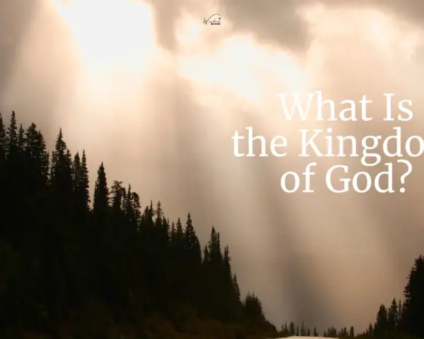 Sunlight streams through clouds over a dark forest, illuminating the question: "What Is the Kingdom of God?