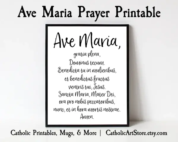 A framed print displays the "Ave Maria" prayer in Latin, perfect for a moment of reflection or a beautiful chant.
