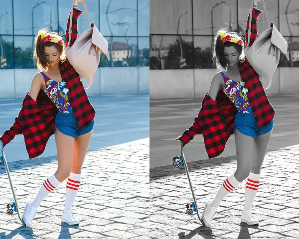 Jeune femme avec un skateboard, chemise à carreaux rouge, short en jean et chaussettes rayées. La photo présente une désaturation partielle, mettant en valeur les couleurs vives de sa tenue.