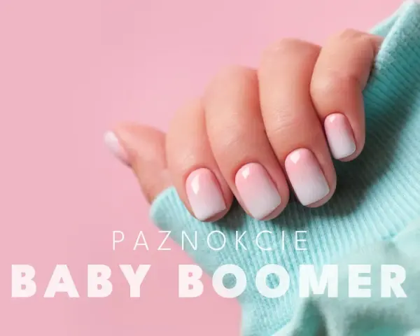 Dłoń z paznokciami hybryda baby boomer w delikatnym różowo-białym ombre, na tle pudrowego różu i turkusowego materiału.