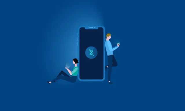Dos personas usan sus móviles junto a un gran smartphone. Explica qué es Bizum y cómo funciona, una forma fácil de enviar dinero.