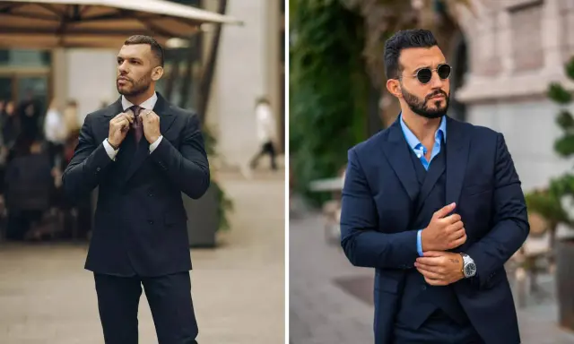 Two men in sharp navy suits, ready for a cocktail attire event. One adjusts his tie, the other sports sunglasses.