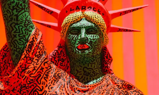 A Statue of Liberty reimagined with Keith Haring's iconic graffiti style. His bold lines and vibrant colors made him important for bringing art to the masses.