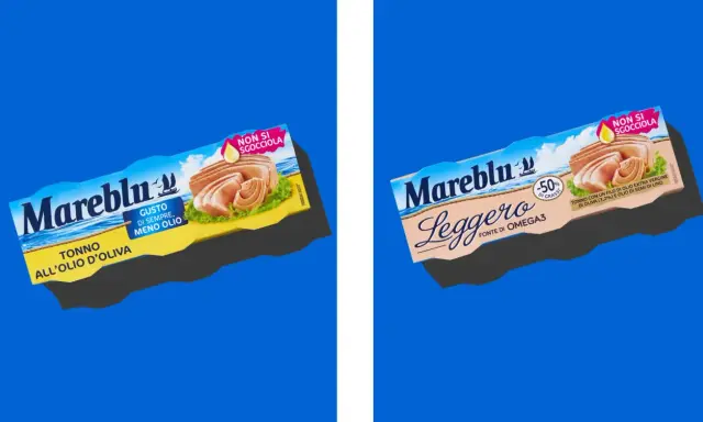 Due scatolette di tonno Mareblu, una all'olio d'oliva e l'altra "Leggero", con immagini di questa specie di tonno.