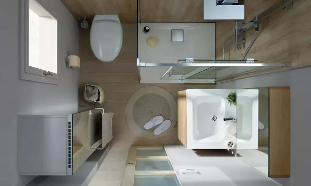 Aménagement petite salle de bain : vue de dessus d'une douche, lavabo, WC et meuble de rangement.