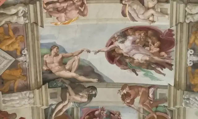 La Création d'Adam dans la Chapelle Sixtine. Photos interdites pourquoi ? Pour préserver ces fresques divines de la lumière et de l'humidité.