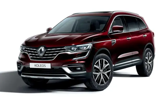 Elegancki, bordowy Renault Koleos 2.0 dCi z chromowanymi detalami i felgami 19 cali, gotowy na każdą podróż.