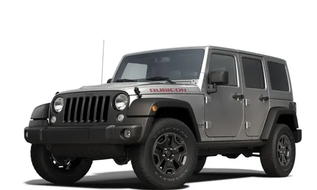 Un coche Jeep Rubicon plateado, listo para la aventura, con la palabra "Rubicon" en rojo sobre el capó.
