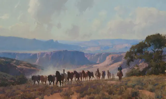 A herd of horses moves through a canyon landscape, guided by a lone rider. This scene captures the spirit of western artists.