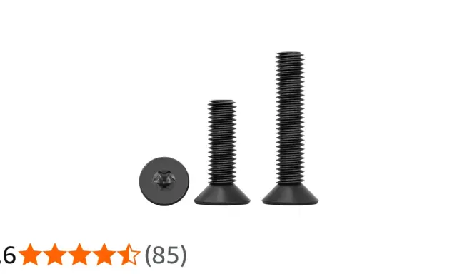 Tres tornillos estrella negros, uno de frente y dos de perfil, uno más corto que el otro.