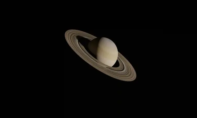 Saturn w Lwie, majestatyczna planeta z pierścieniami, unosząca się w kosmicznej ciemności.