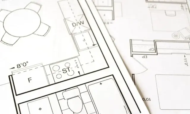 Plany architektoniczne pokazują, jak obliczyć metry kwadratowe pokoju, z zaznaczonymi wymiarami i elementami wyposażenia.
