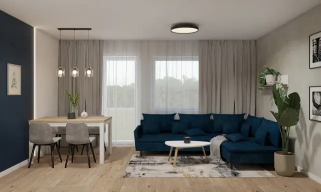 Nowoczesny salon z granatową kanapą i stołem. Dwie lampy wiszące nad stołem i jedna sufitowa tworzą przytulną atmosferę.