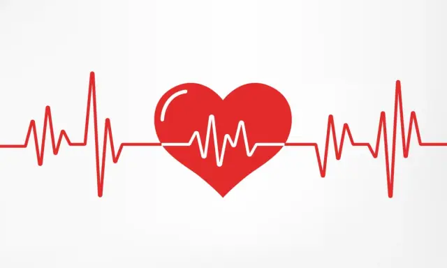 Czerwone serce z linią EKG symbolizującą puls człowieka.