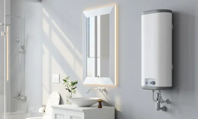 Modernes Badezimmer mit einem weißen Warmwasserspeicher, der wie ein durchlauferhitzer für warmwasserspeicher funktioniert. Daneben ein beleuchteter Spiegel.
