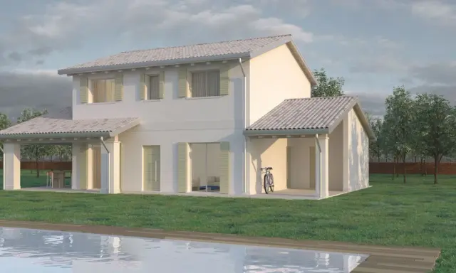 Case a due piani con portico, piscina e giardino. Una bicicletta appoggiata al muro.