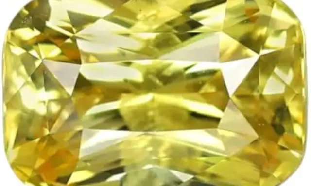 Zaffiro giallo brillante, simbolo di gioia e prosperità. Il suo significato è legato alla saggezza e all'abbondanza.
