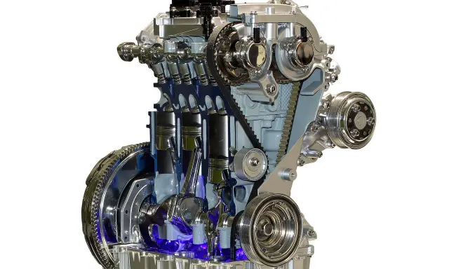 Przekrój silnika 1.0 Ecoboost z widocznym rozrządem. Sprawdź, jaki jest koszt wymiany rozrządu w tym modelu.