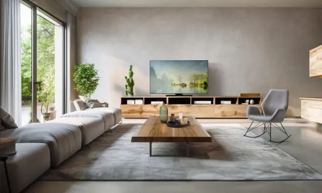 Modernes Wohnzimmer mit großem Sofa, TV-Möbel und Schaukelstuhl. Tolle kabel verstecken ideen für ein aufgeräumtes Ambiente.