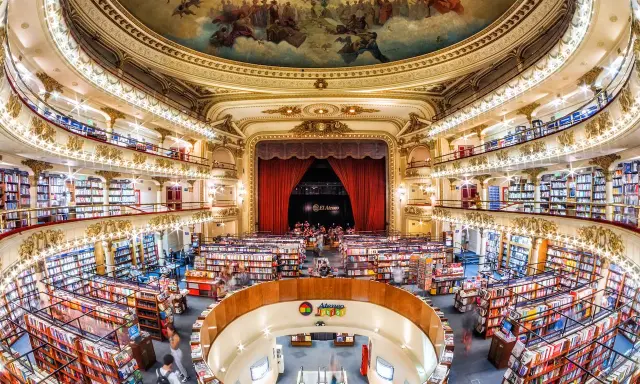 El Ateneo Grand Splendid, a former theatre, is a stunning bookstore in Buenos Aires, showcasing its opulent architecture and vast book collection.