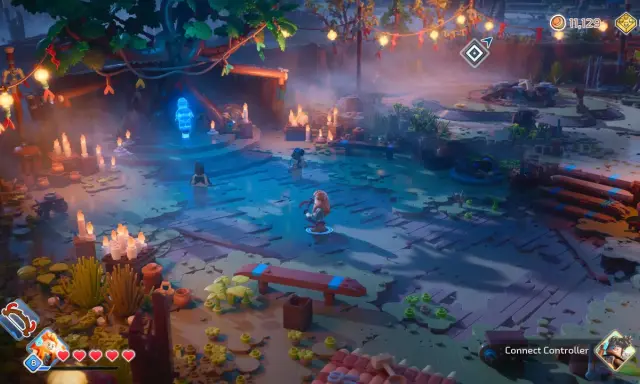 Witaj w świecie Lego Horizon Adventures! Postacie z klocków eksplorują tajemniczą, oświetloną świecami krainę.