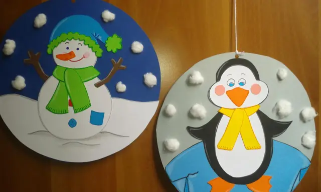 Pupazzi di neve e pinguini colorati, perfetti per le decorazioni invernali scuola primaria.