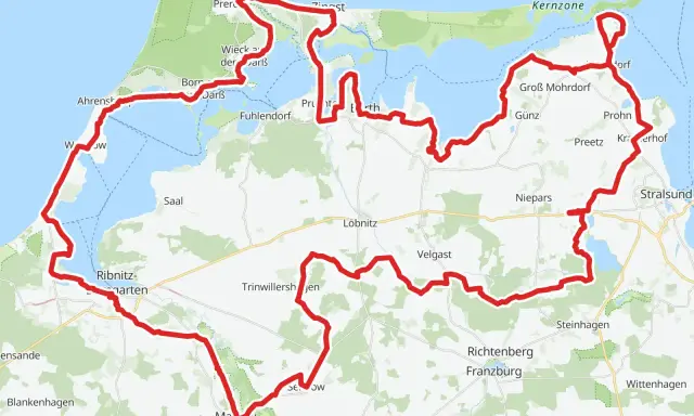 Mapa z zaznaczonymi trasami rowerowymi w Niemczech, wiodącymi przez malownicze wybrzeże i park narodowy.