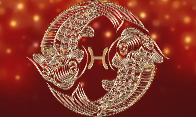 Złote ryby, symbol zodiaku, unoszą się w tle pełnym ciepłych, migoczących świateł. To znak, który często kojarzony jest z intuicją i marzeniami, a dla niektórych może symbolizować szczęśliwe liczby.
