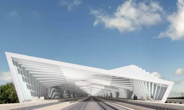 Stazione Reggio Emilia, un capolavoro dell'architetto con un tetto bianco a spirale che copre i binari.