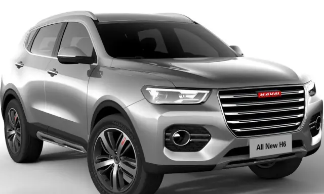 Srebrny SUV Haval H6 z nowoczesnym grillem i światłami LED.