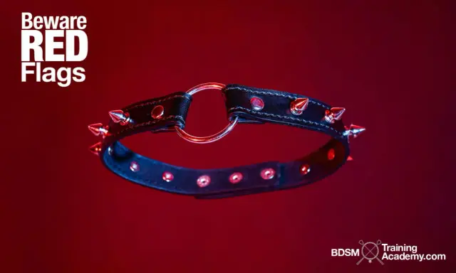 Czarny, kolczasty kołnierz z metalowym kółkiem, symbolizujący ostrzeżenie przed czerwonymi flagami w relacji BDSM.