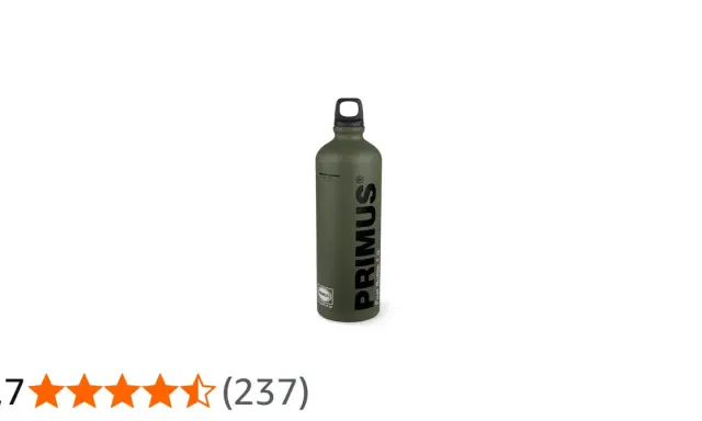 En grön Primus flaska för bränsle, redo för äventyr.