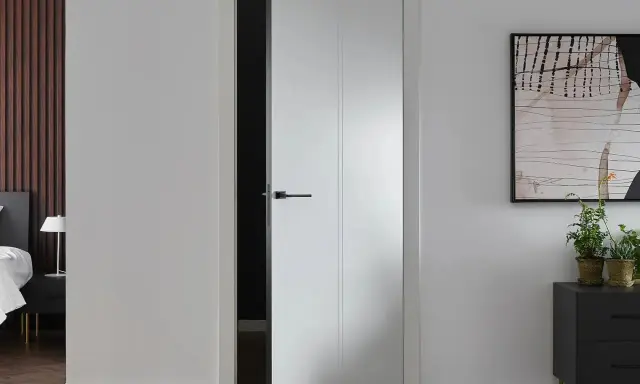 Nowoczesne białe drzwi wewnętrzne aranżacje. Minimalistyczny design, czarna klamka, stylowy dodatek do wnętrza.
