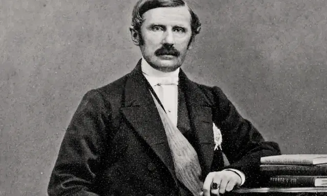 Johan August Gripenstedt, en framstående svensk politiker, porträtterad med mustasch och klädd i mörk kostym.