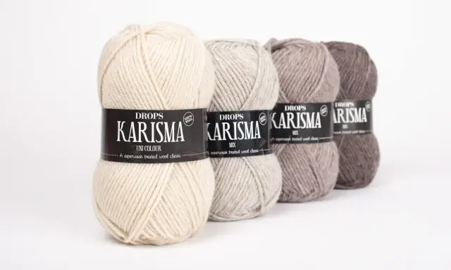 Fyra nystan Drops Karisma i olika jordnära färger. Perfekt garn för att sticka något som inte kliar.