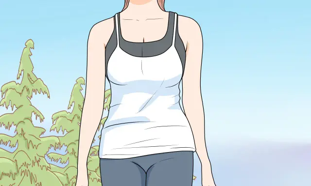 Ragazza sorridente in abbigliamento sportivo, pronta per imparare come correre correttamente tra gli alberi.