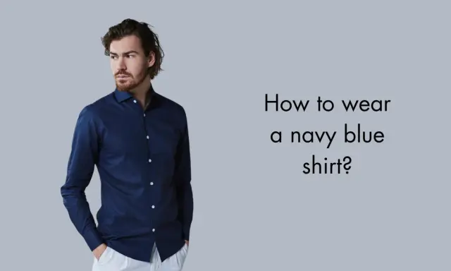 Man in a navy blue shirt and white pants, asking "How to wear a navy blue shirt?".