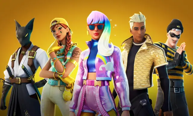 Pięć postaci z Fortnite, w tym kot-samuraj i dziewczyna z tęczowymi włosami. Szukasz **fortnite kody na skiny**?