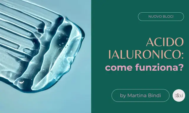 Goccia di acido ialuronico trasparente su sfondo azzurro, con testo "Acido Ialuronico: come funziona?".