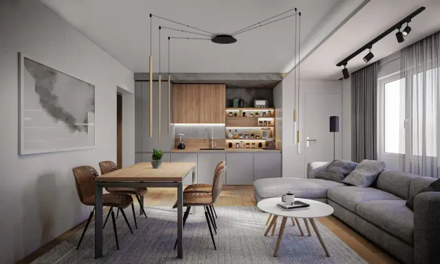 Nowoczesne oświetlenie w salonie inspiracje: wiszące lampy nad stołem, punktowe nad kanapą i podświetlane półki w kuchni tworzą przytulną atmosferę.