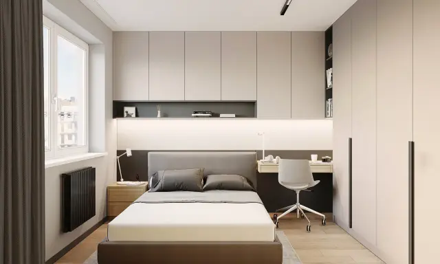 Dormitorio moderno con cama, escritorio y armarios empotrados. Ideas de almacenamiento de dormitorio para maximizar el espacio.
