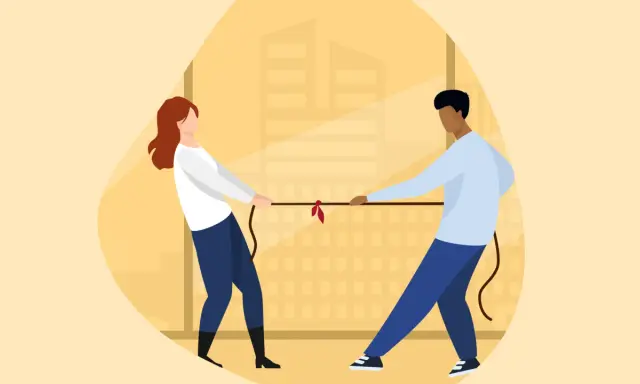 Man en vrouw trekken aan een touw, een metafoor voor conflicten oplossen.