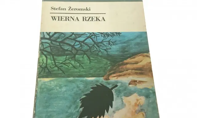 Okładka książki Stefana Żeromskiego "Wierna rzeka". Malownicza ilustracja przedstawia drzewo nad wodą, symbolizującą wierną rzekę.